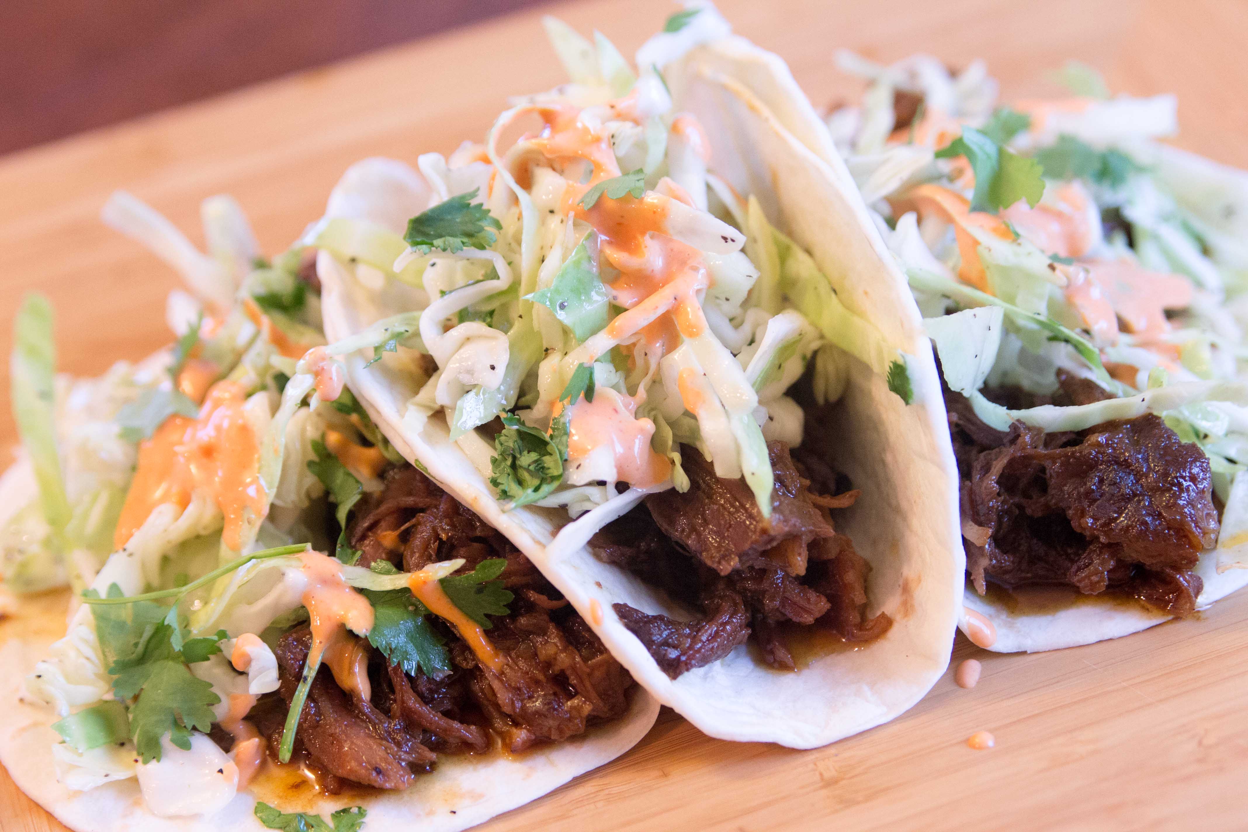 Korean BBQ Street Tacos with asian slaw made in the slow cooker.